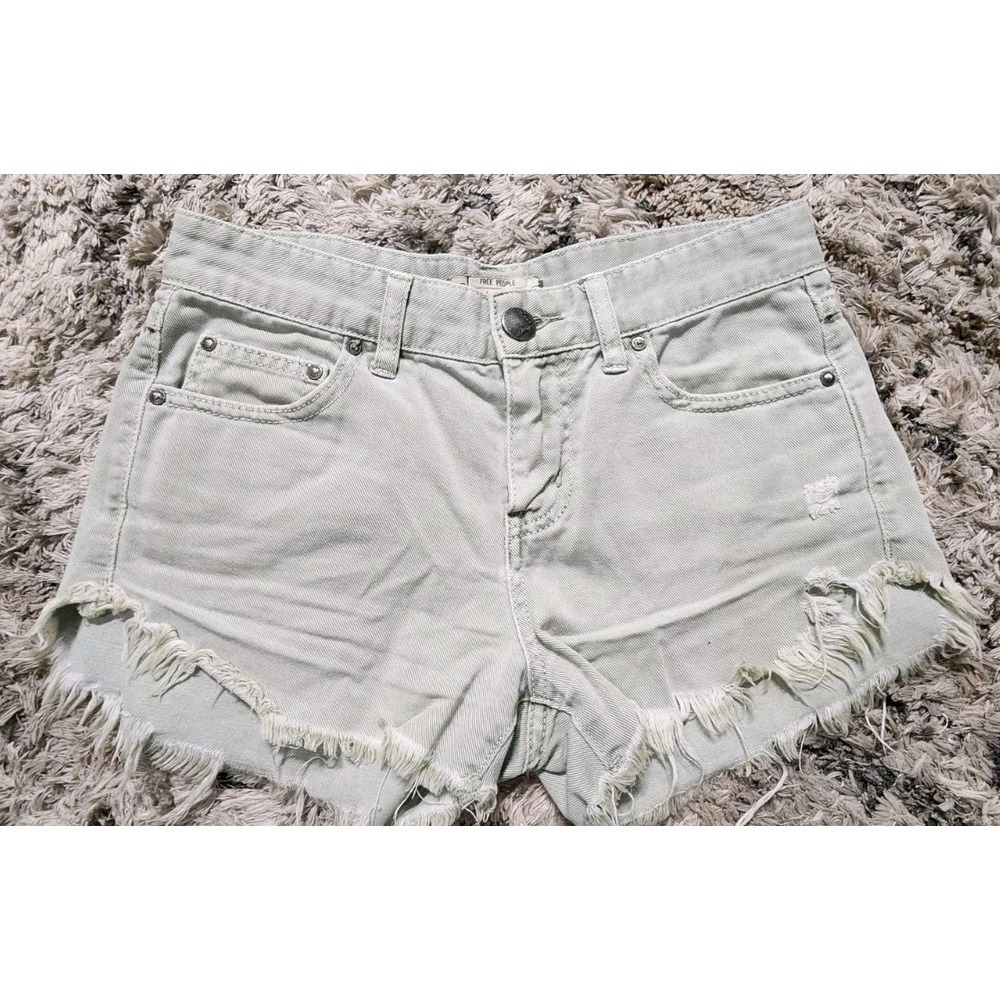 FREE PEOPLE Sage Olive Green Distressed Mid Rise Raw Hem Denim Shorts Size 24